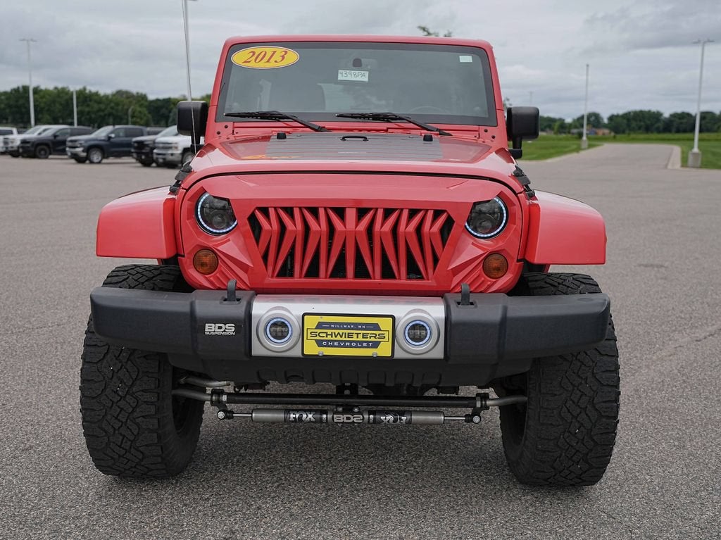 Used 2013 Jeep Wrangler Unlimited Sahara with VIN 1C4BJWEG3DL594635 for sale in Willmar, Minnesota